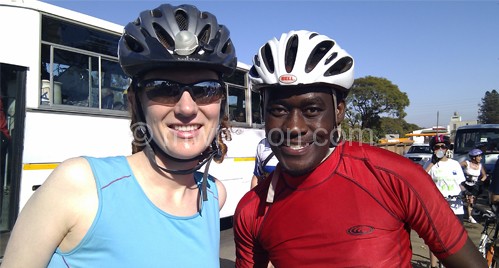 Tengani (R) and another cyclist on one of their recent tours