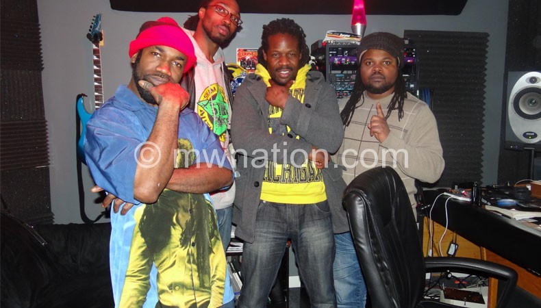 CODE (2nd R) posing with Wayne and others in studio