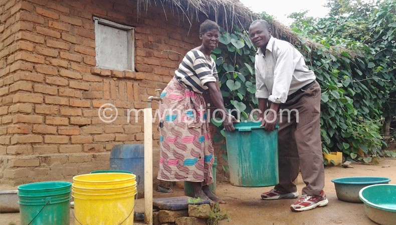 Chipekupeku and his wife Msukwa are leading by example by using piped water 