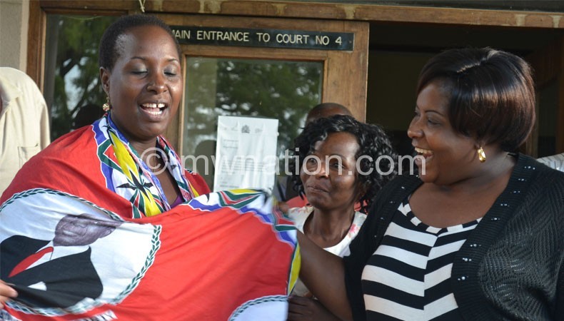 Kabwila celebrating with well-wishers
