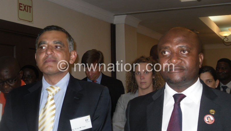  EY country managing partner Shiraz Yusuf (R) with Matola during the launch  