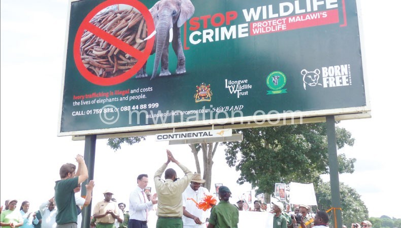 Stakeholders put  up a billboard on Wildlife Day