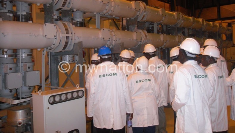 Escom officials inside Kapichila power plant