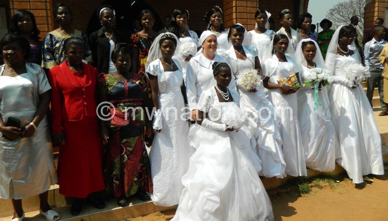 Some of the brides wearing  wedding dresses