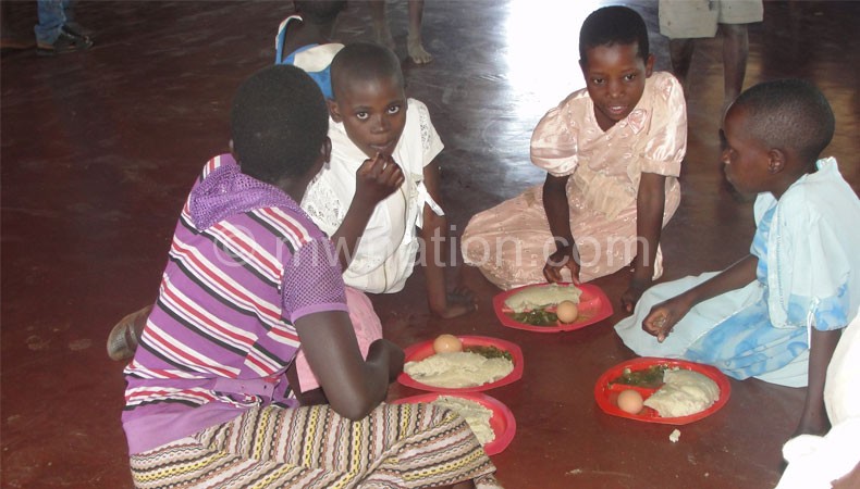 Children having their lunch at Miglat in Chiladzulu, Malawi