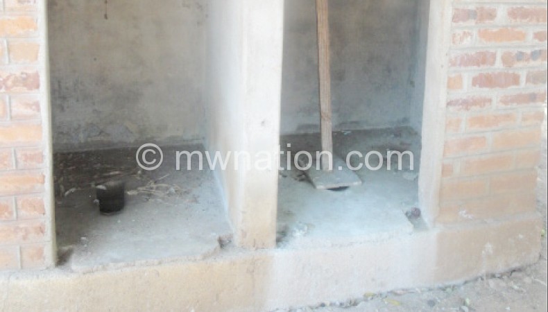The full latrines being used to dump the placentas