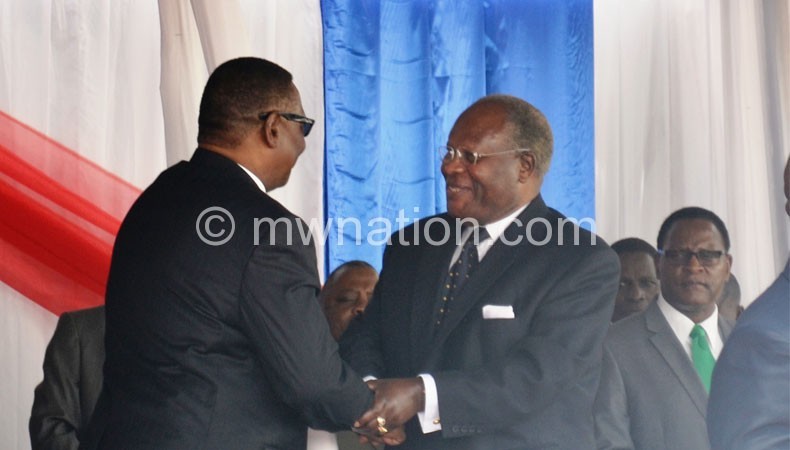 Mutharika greeted Muluzi (C) but snubbed Chakwera (R)