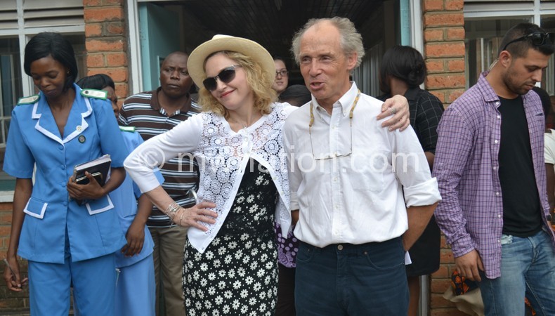 Photo session: Madonna cuts a pose with Paediatrician Dr. Eric Borgestein