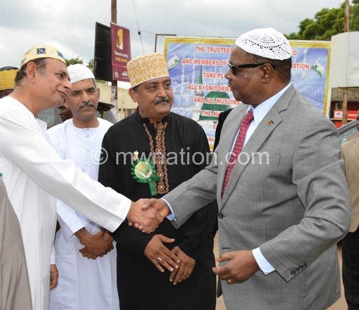 Mutharika wishing well some of the Muslims on Ziyara Parade today