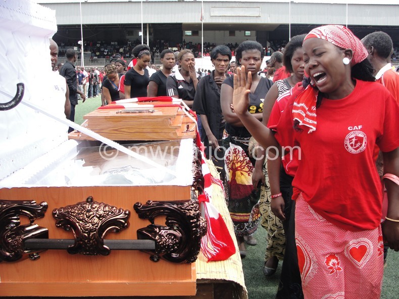 Grief-stricken Bullets supporters captured viewing Chirambo’s body