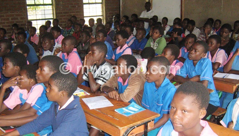 Pupils at a primary school in Blantyre in this file photo: Classes in public schools are usually congested
