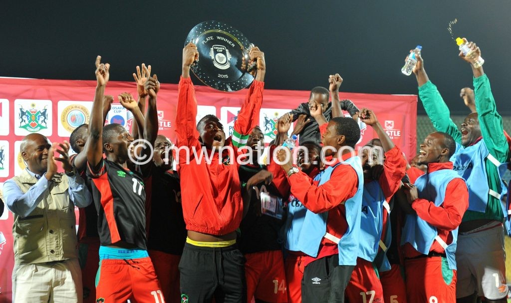 Malawi players celebrate 2015 Cosafa Cup Plate Finals match between Zambia and Malawi at Royal Bafokeng Stadium, Rustenburg on the 29 May 2015  ©Muzi Ntombela/BackpagePix