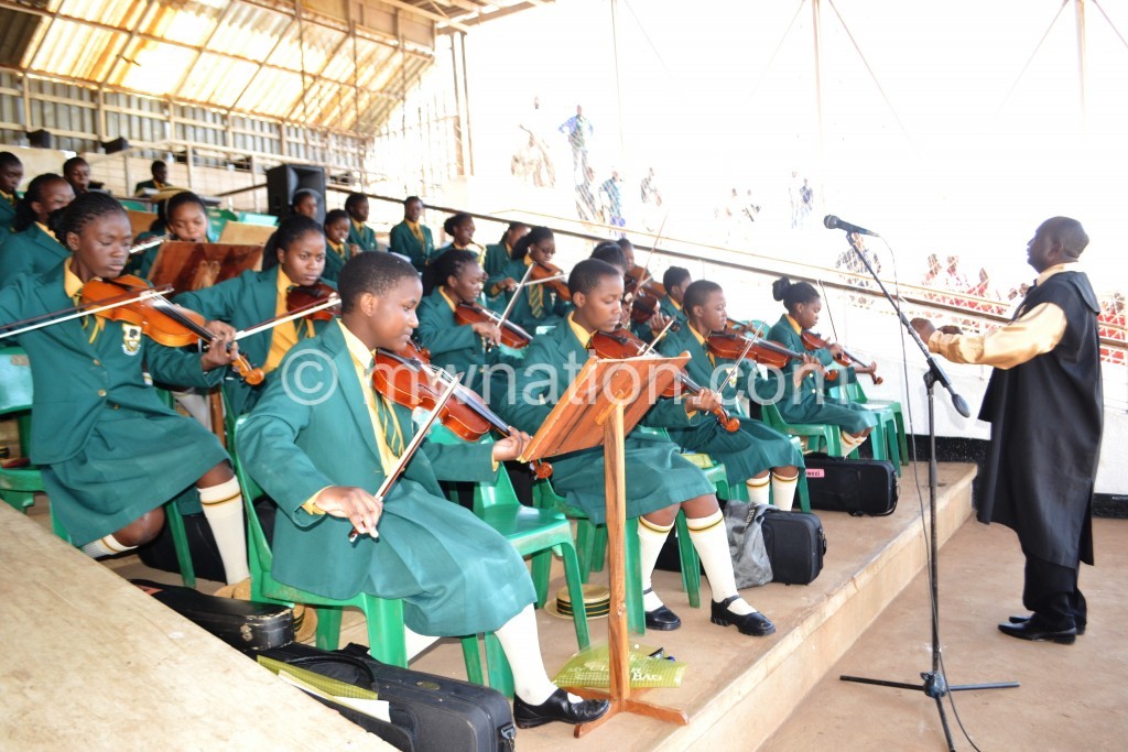 Kamuzu Academy performing led by music director Donald Kaluwire