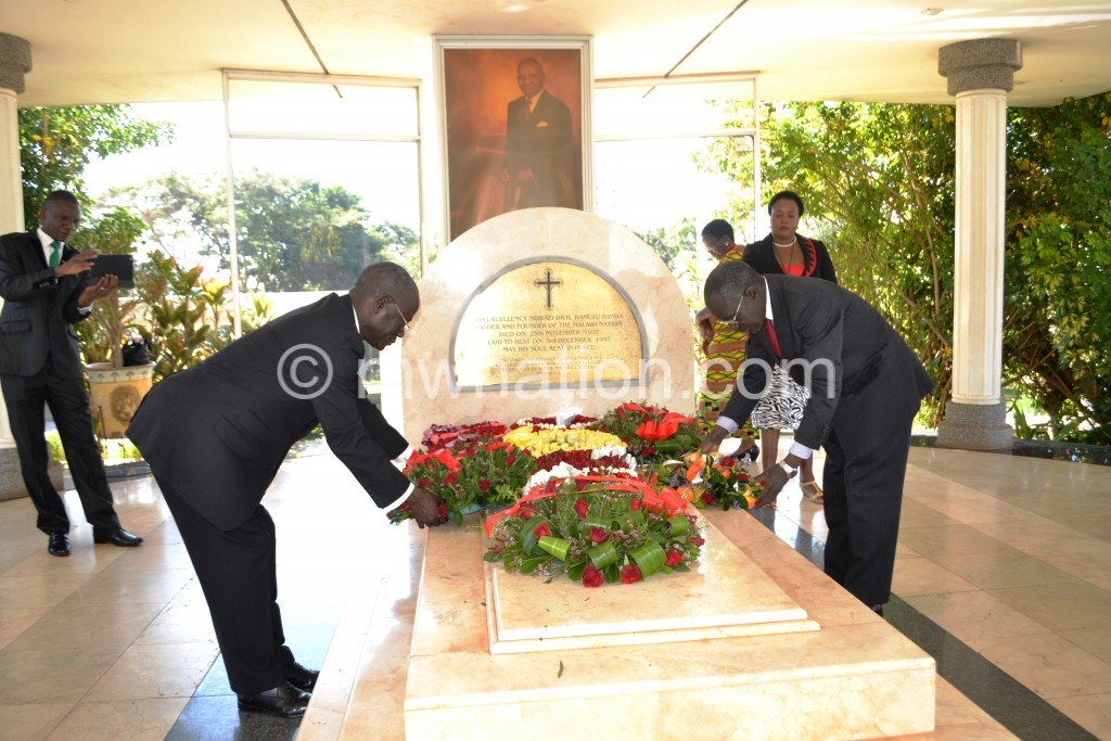 Leonard Chikadya and Francis Perekamoyo lay their wreaths