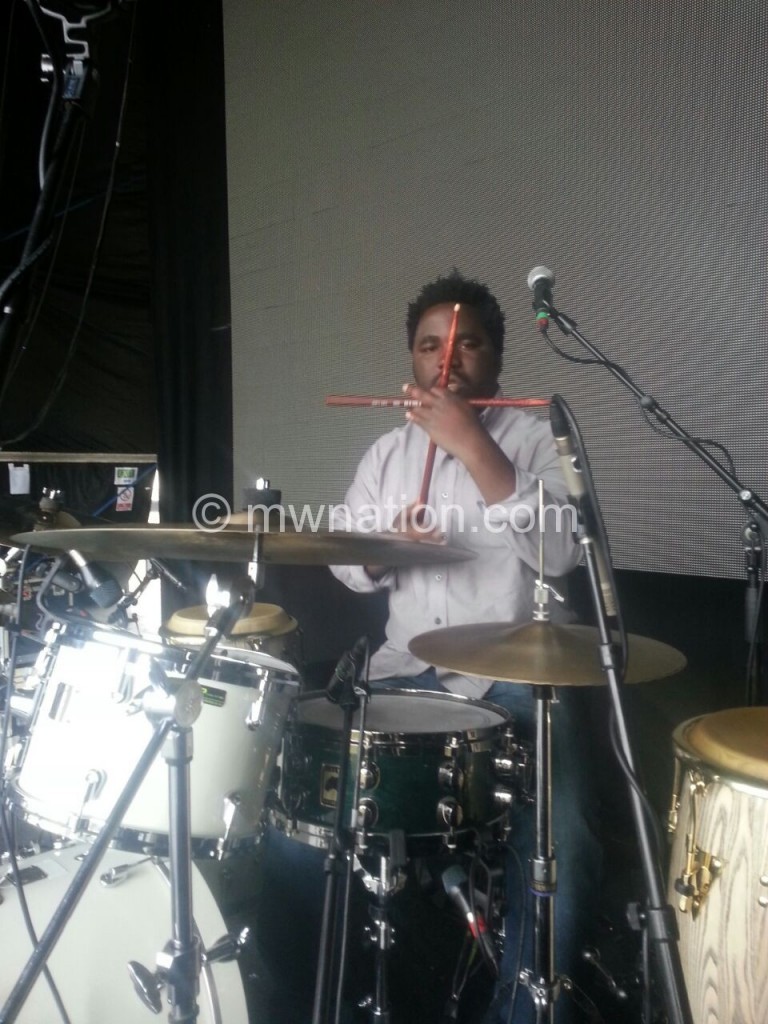Mlolowa at work on the drums during a recent tour of China