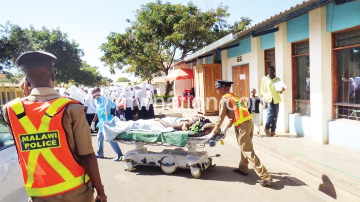 A disabled robbery suspect being taken into Kamuzu Central Hospital 