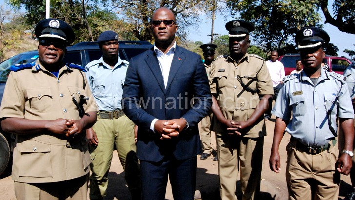 Muluzi touring the damaged Chilomoni Police Sub-Station