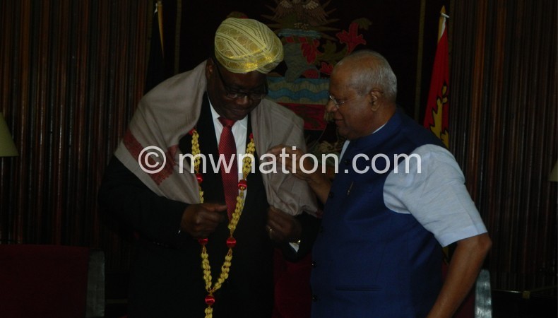 Mutharika fitting Indian traditional wear supervised by Siddeshwara 