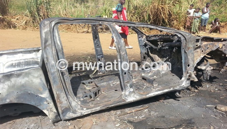 What remained of the vehicle used by the late Njauju after it was torched by the assailants