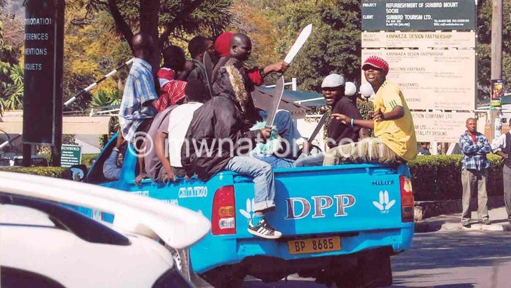 DPP youths brandishing pangas a day before the July 20 2012 demonstrations