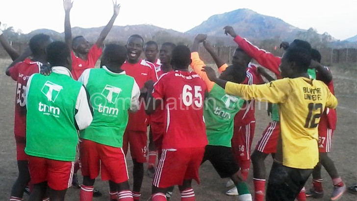 United players celebrate after beating Cobbe