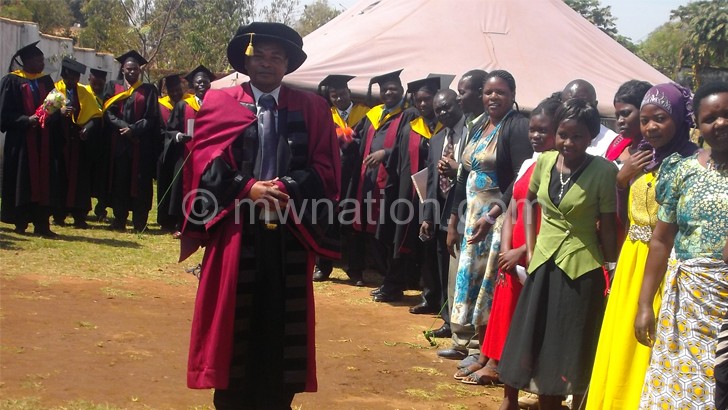 Jumbe walks to receive his degree