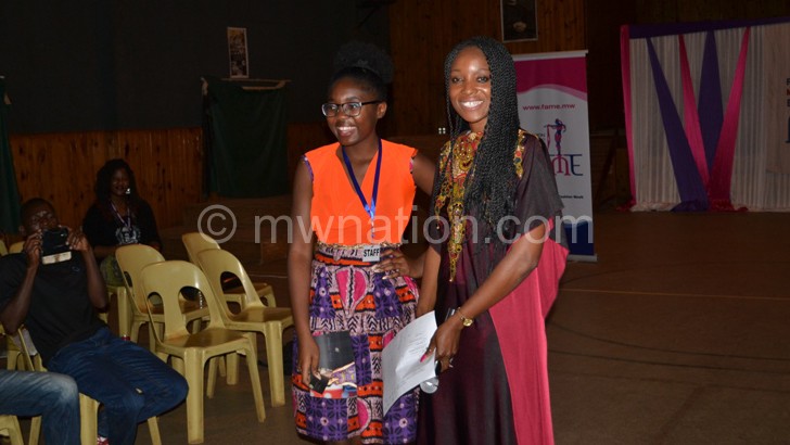 Tawile with Alfonso after her triumph at the Lilongwe fashion event 