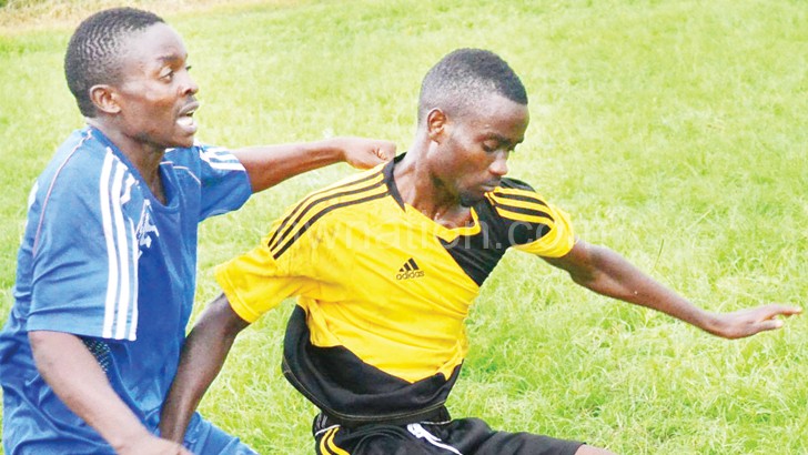 SRFA teams Evirom (in yellow) and Nyasa United in action