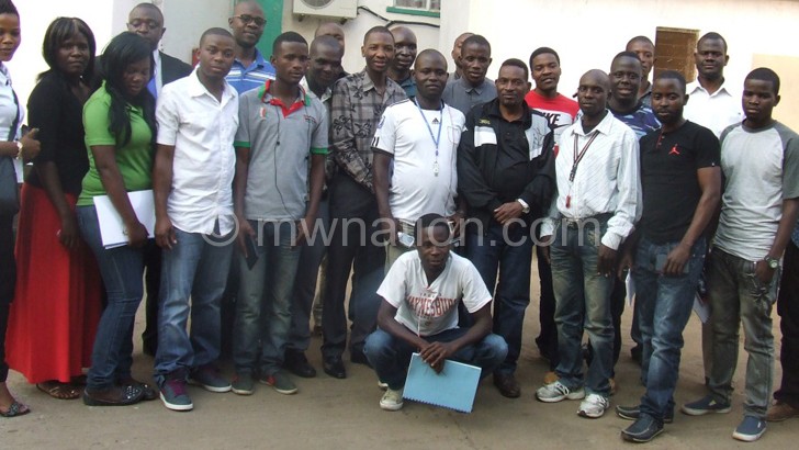 Swam members pose for a group photograph after the workshop
