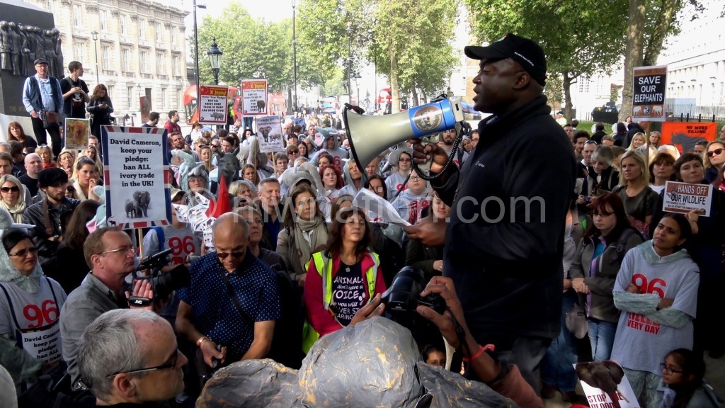 Musyani addressing marchers in London