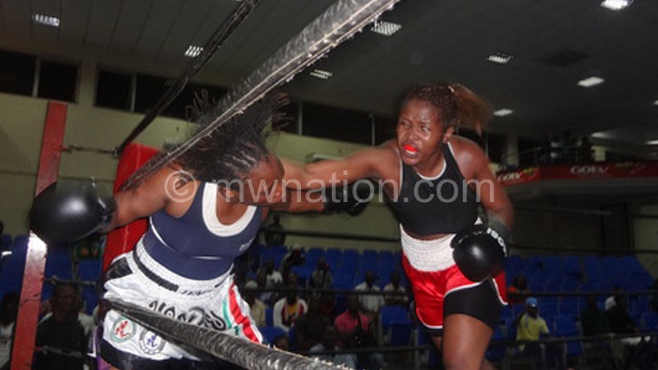 Mtimaukanena (R) defeated Kenyan and Tanzanian boxers