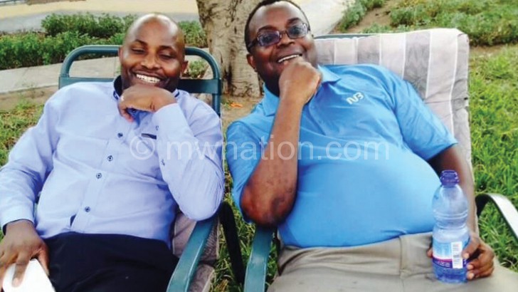 Yabwanya (L) and Mijiga (R) relaxing before the vacation of the injunction 