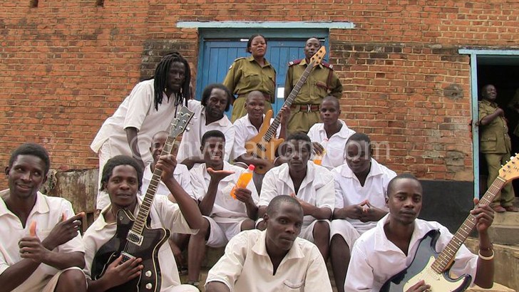 Zomba Prison Project group members pose with the warders during the recording sessions