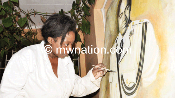Eva at work on a painting