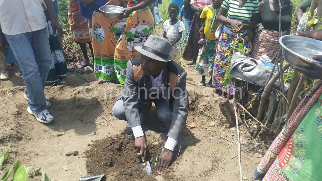 T/A Kunthembwe planting a tree
