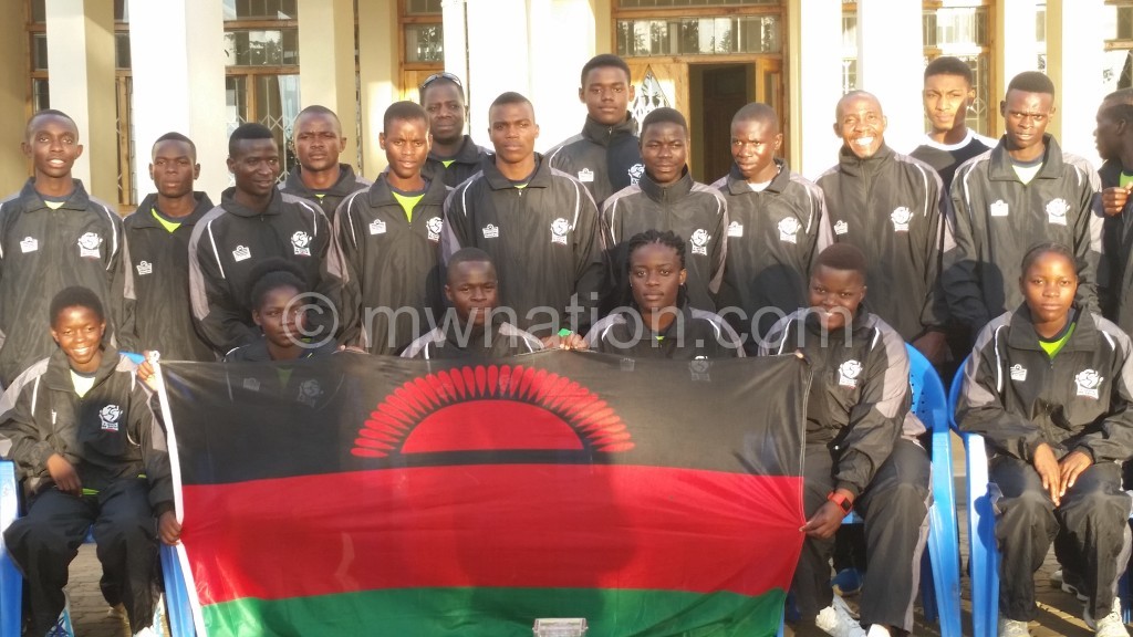The athletes pose before their Zimbabwe trip on Tuesday