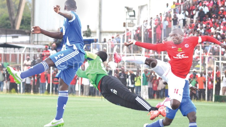 Top drawer: Dynamos goalkeeper Mateyaunga denies Chiukepo Msowoya (R) with an incredible save