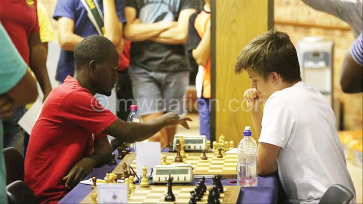 Chipanga (L) taking on South African opponent 