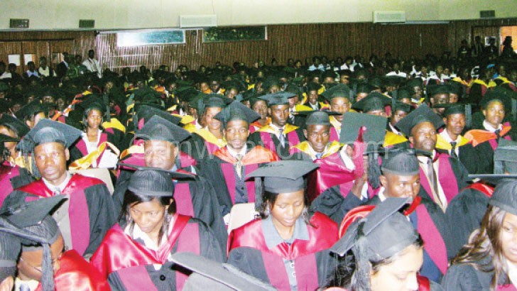 Graduands celebrate after getting a college degree at Chanco