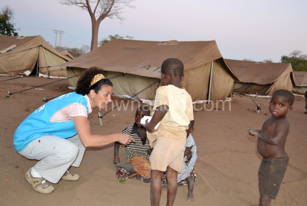 Novak-Irons chats up refugee children just after arrival at Luwani Camp