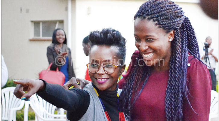 Kansiime poses with journalist Olivia Mgusha after the interviews