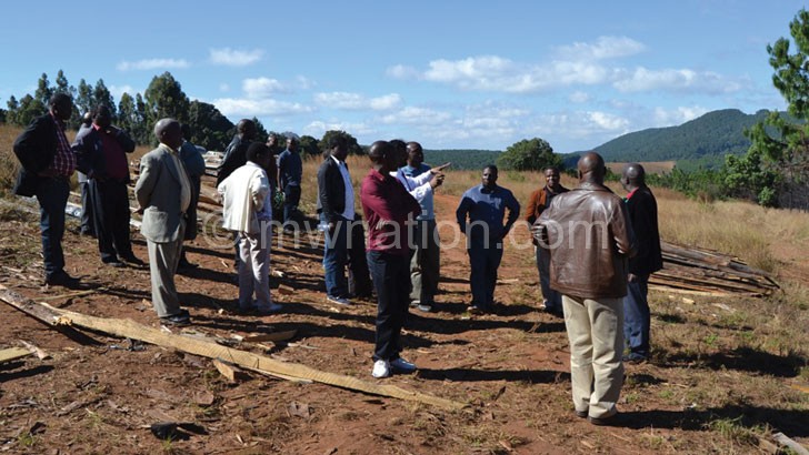 Hopeless--MPs and officials from Raiply Malawi Limited tour the depleted Chikangawa Forest on Saturday.