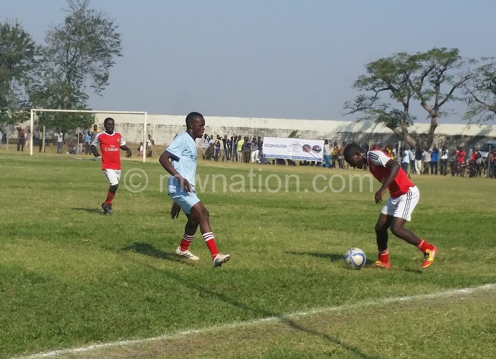 Dululu (in blue) in action against Mwanza Madrid in the  early stages of the competition 