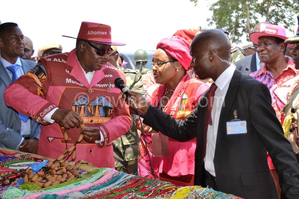 Mutharika being briefed at one of the pavilions