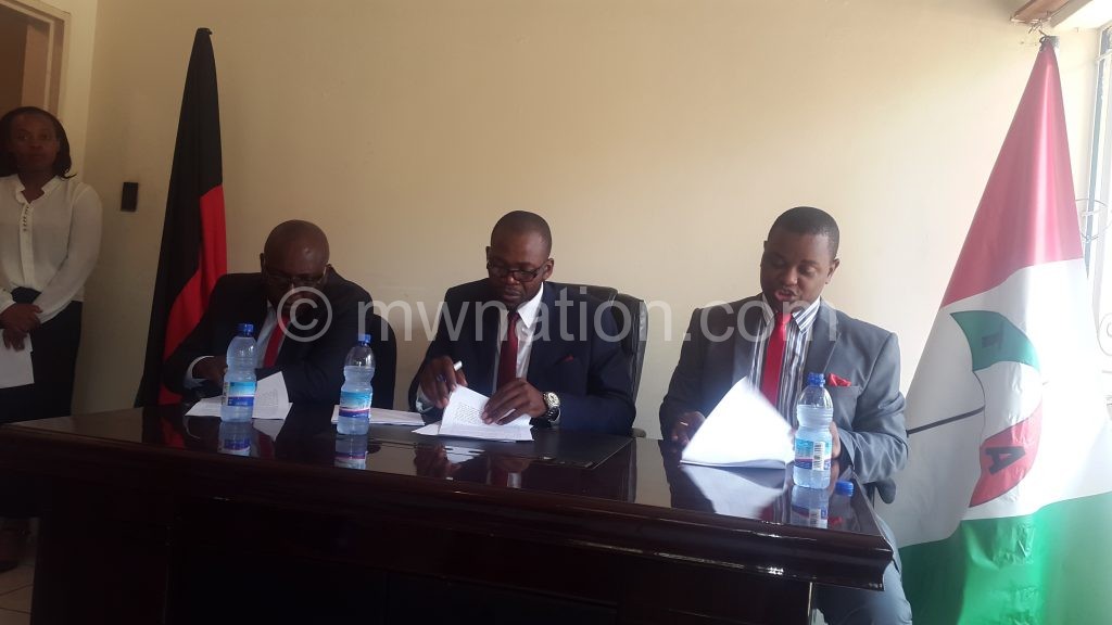 Chimbanga (R), Kunkuyu (C) and Mwambyale captured during the press briefing on Tuesday
