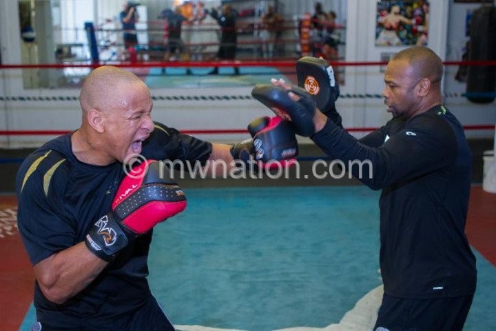 Chilemba (L) spars with Jones ahead of the fight