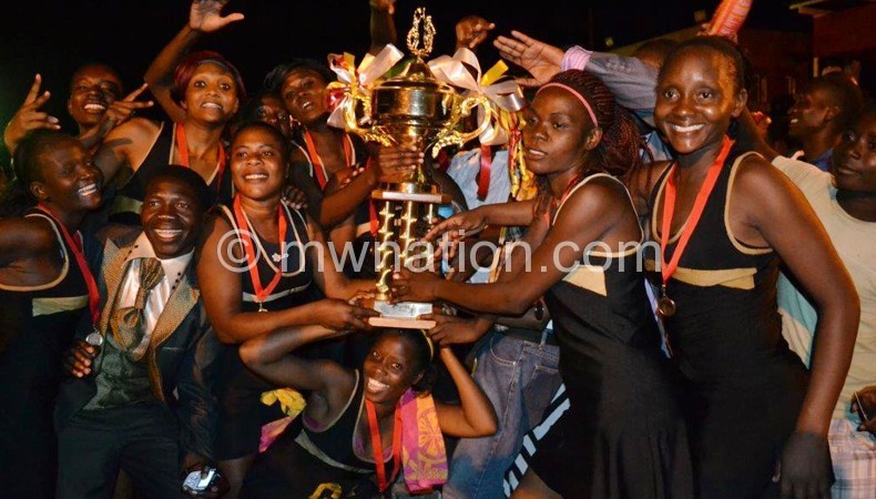 Tigresses celebrate with their trophy