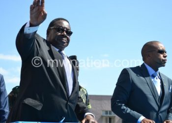 Mutharika (L) won the election on May 20.