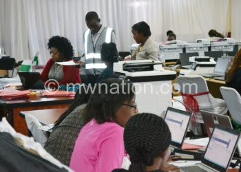 Flashback: MEC staff computing data at the National Tally Centre in Blantyre