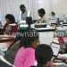 Flashback: MEC staff computing data at the National Tally Centre in Blantyre